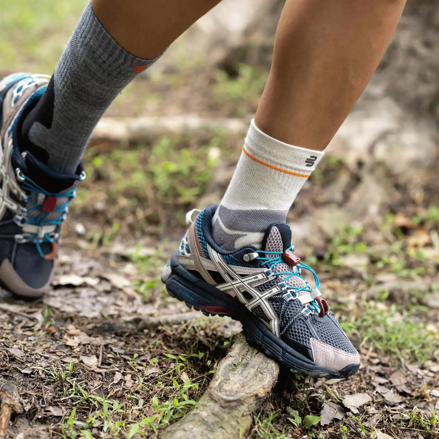 merino compression ankle sleeve on a hiking trail